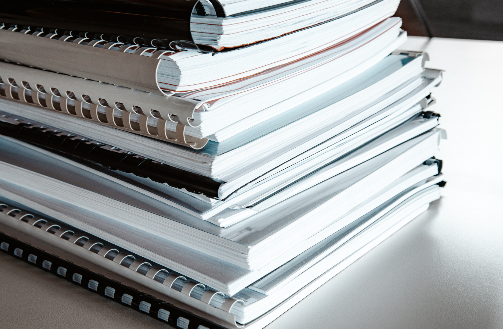 Stack of paper reports