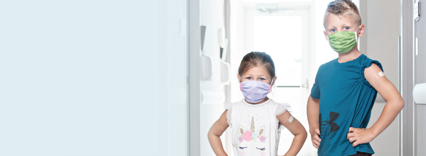 Picture of two children after their flu vaccines.