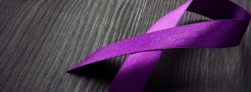 Picture of purple ribbon representing loss of life due to overdose